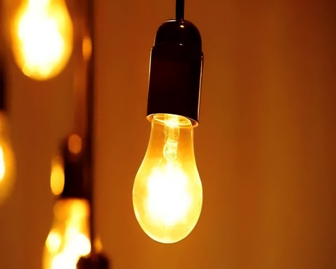 Nitrogen used in incandescent light bulbs as an inexpensive alternative to argon.